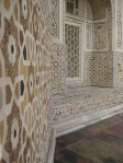 Outside wall of the tomb inlaid with various stones